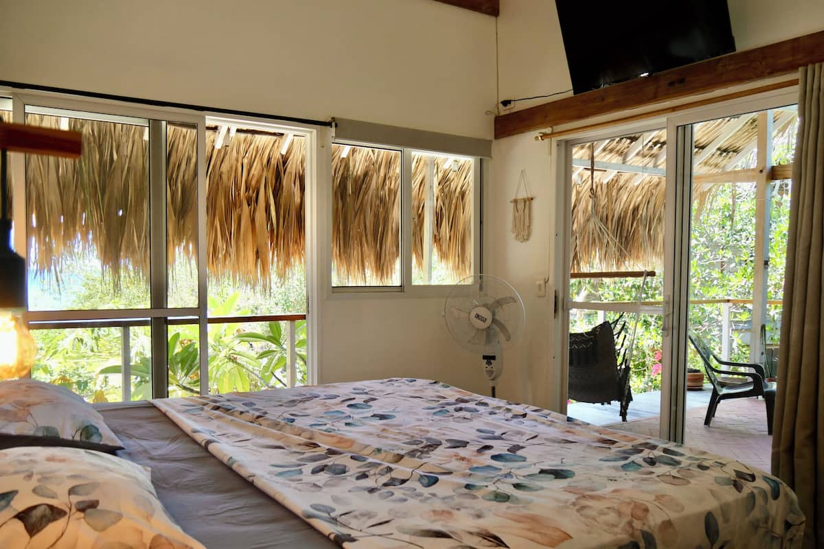 Habitación doble Deluxe, vista al océano | Wifi gratis y ropa de cama