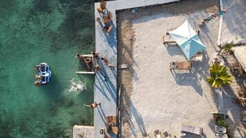 Private beach, white sand, beach umbrellas, beach towels