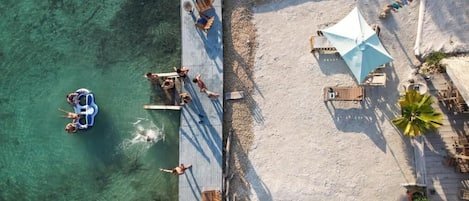 Private beach, white sand, beach umbrellas, beach towels