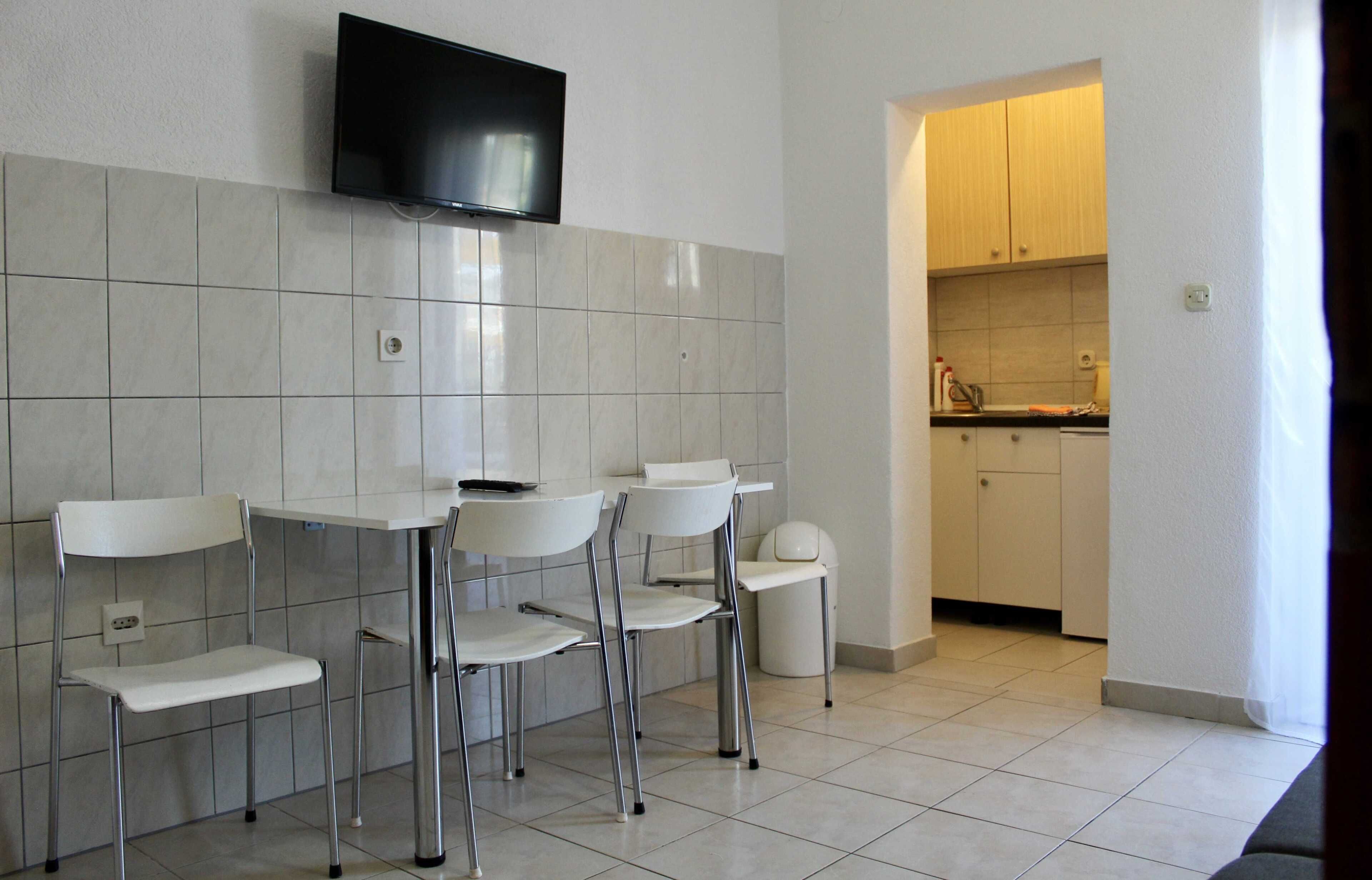 Apartment (Comfort One Bedroom Apartment with Ba) | Living room | 32-inch flat-screen TV with satellite channels