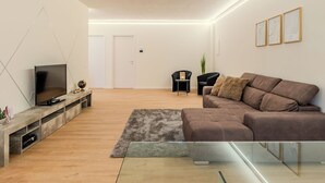 A modern living room with a flat-screen TV, a sofa, a coffee table, and a glass railing. - Terrazza Segreta around Como Lake by Interhome (Carlazzo)