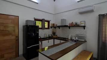 Suite Studio, cuisine, vue jardin | Cuisine privée