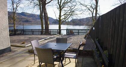 House on the shores of Loch Shiel in Historic Glenfinnan, Monument and Viaduct
