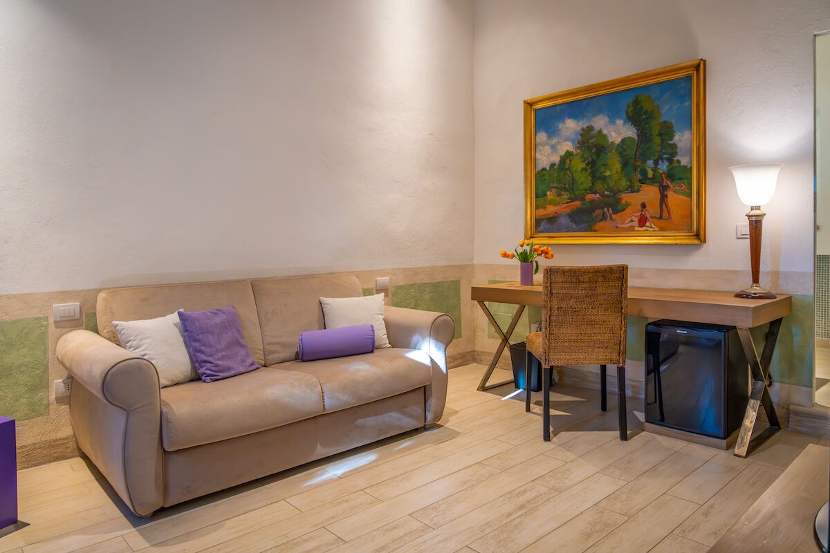 Suite, Balcony, Garden View | Lounge