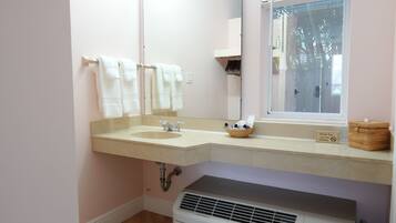 Hair dryer, towels, soap, shampoo