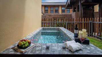 Suíte premier, vista para o jardim | Piscina particular
