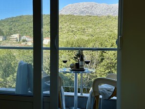 Estúdio conforto, vista para a montanha | Opções para refeição