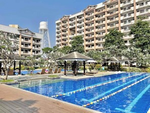 Pool - 2-bedroom condo minutes away from MOA, Airports, Makati and Big Malls. (NCR)