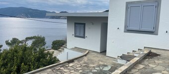 spacious luxury villa with hot tub and path to beach