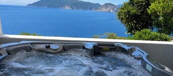  spacious luxury villa with hot tub and path to beach