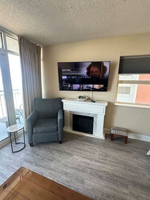 TV, fireplace - Sunny Shores Oceanview Condo (Myrtle Beach)