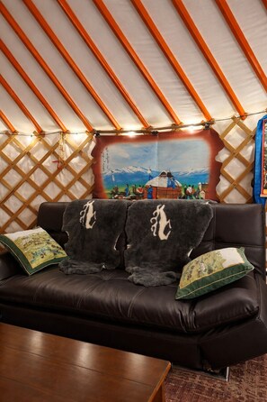 Living area - Luxury Nomadic Yurt Romantic Getaway with Sauna and Hot Tub on private 8 acres (Keyser)