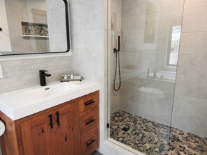 Shower, towels, soap, toilet paper