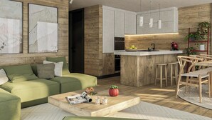 A modern living room with a green sofa, a coffee table with magazines and glasses, and a kitchen area with wooden cabinets and a bar. - Alphubel Peak & Unlimited by Interhome (Saas-Fee)