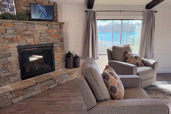 Unwind by the gas fireplace after a full day spent enjoying the lake.