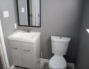 Shower, towels, soap, toilet paper