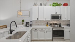 Fridge, microwave, oven, stovetop - 2BR Resort Condo Near Disney – Family Ready (Davenport)