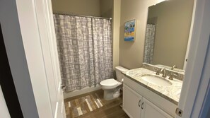 Shower, hair dryer, towels, soap - 4-bedroom house with 3 bathrooms, a 3-car garage, and plenty of open space. (Punta Gorda)