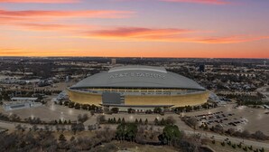 A stadium with a large, curved roof and the name 'AT&T Stadium' on it. - Walk to World Cup Games! Walk to AT&T & Globe Life + Small Yard (Arlington)