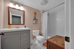 Hair dryer, towels, soap, toilet paper