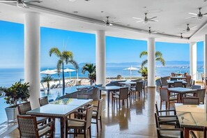 Apartment, Multiple Beds, Pool Access, Partial Ocean View (Grand Miramar B101) | Outdoor dining - Partial Ocean-view Suite With 3 Pools, hot Tub, spa & Balcony (Puerto Vallarta)