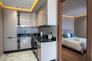 Private kitchen - Cozy Apartment near Corniche & Mosque Hassan II • Balcony • Parking & Wi-Fi (Casablanca)