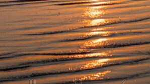 A sunset over the ocean with waves on the shore. - 1 or 2 Wonderful private RV spots,full hookups. 5 min walk to beach on Bolivar (Bolivar Peninsula)