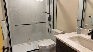 Hair dryer, towels, soap, toilet paper