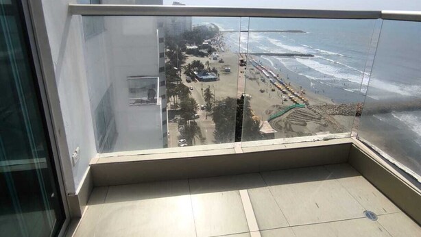 A balcony with a clear view of the beach and ocean. - The little house on the beach (Cartagena de Indias)
