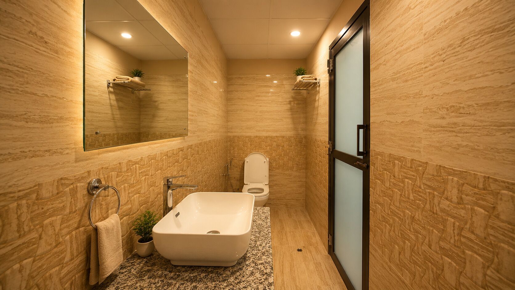 A modern bathroom with a freestanding bathtub, a toilet, and a glass shower enclosure.