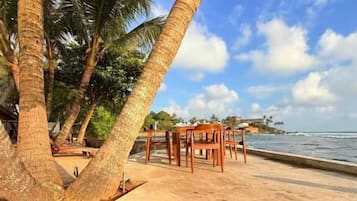 Luxury Apartment, Balcony, Sea View | Outdoor dining