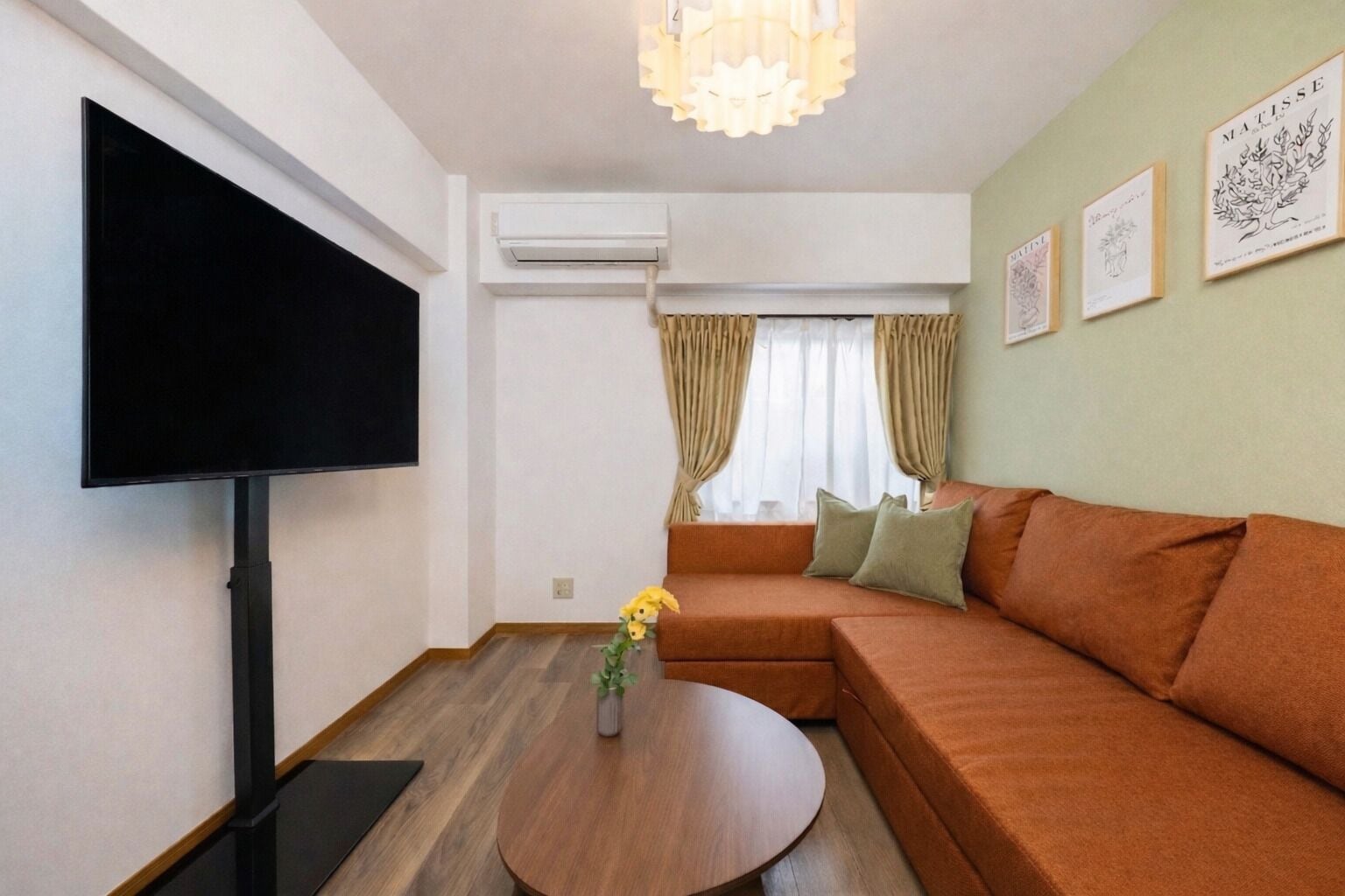 Comfort Apartment, Non Smoking (305) | Living area | 50-inch flat-screen TV with cable channels