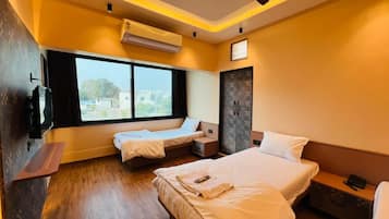 Habitación triple Deluxe