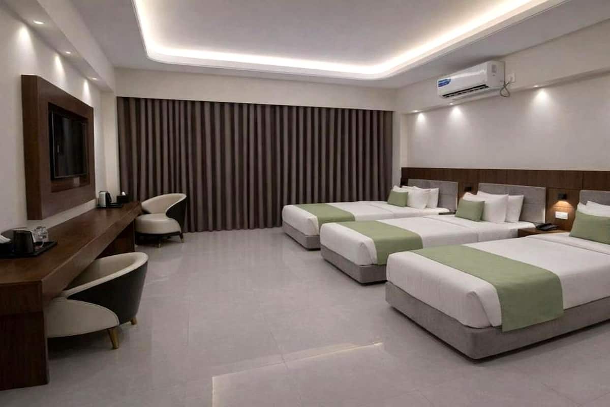 Quarto triplo premium, vista para a cidade