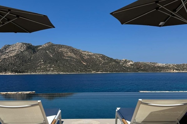Seasonal outdoor pool, open 10:00 AM to 8:00 PM, pool umbrellas