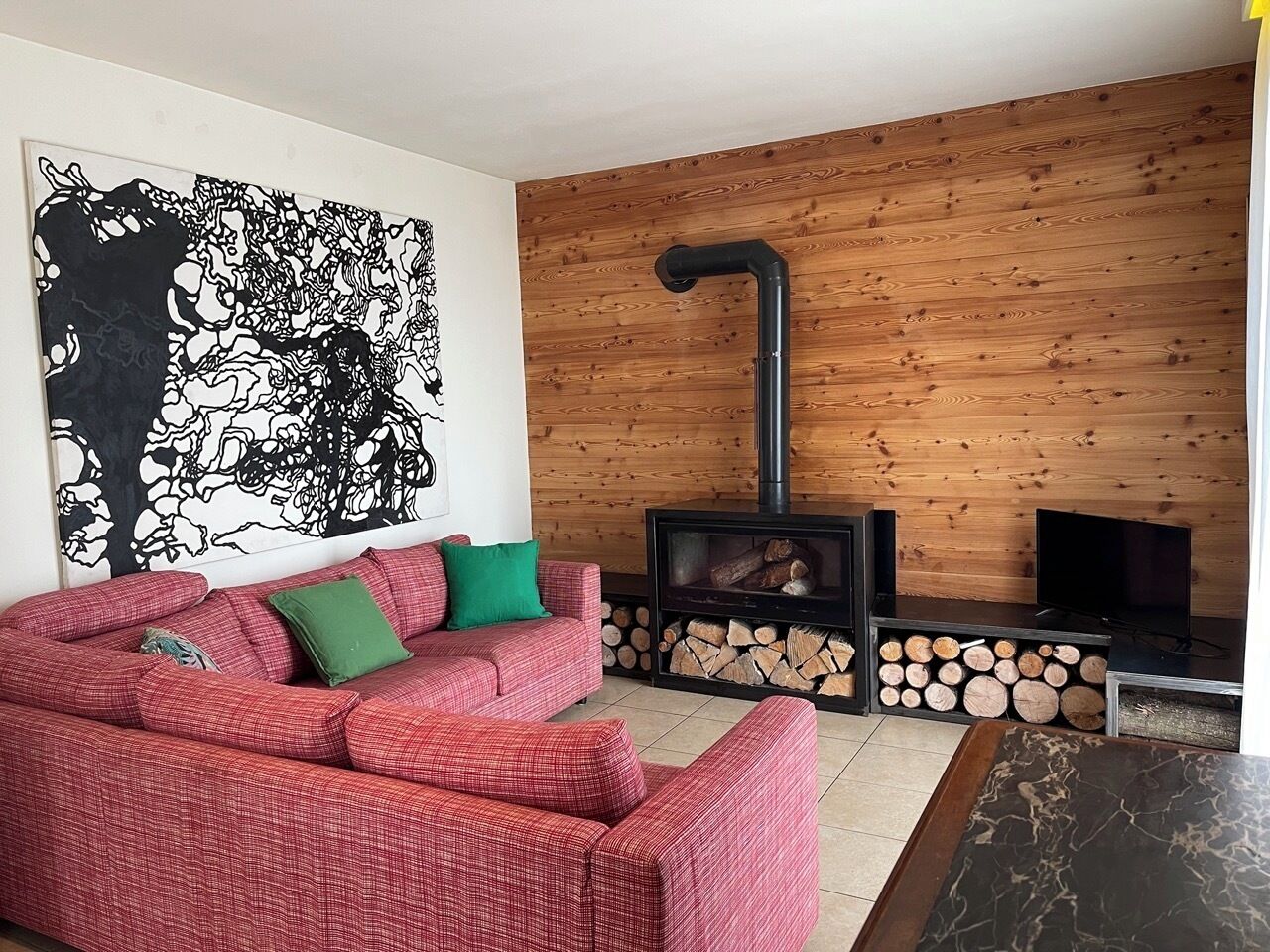 Maison Design, patio, vue lac | Coin séjour