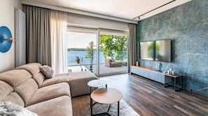 Luxury Apartment, Lake View | Living area | Flat-screen TV - Mazury.Holiday Apartments Giżycko (Giżycko)