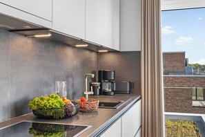 Private kitchen - Modern Apartment Pure Travemünde with Terrace, Parking and Partial Sea View (Lübeck)