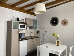 Fridge, microwave, coffee/tea maker, toaster