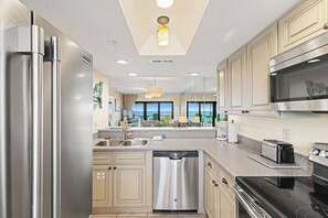 Fridge, microwave, oven, stovetop - Unit 302 – Gulf-Front 1BR/2BA Condo with Stunning Beach Views | Sleeps 4 (Panama City Beach)