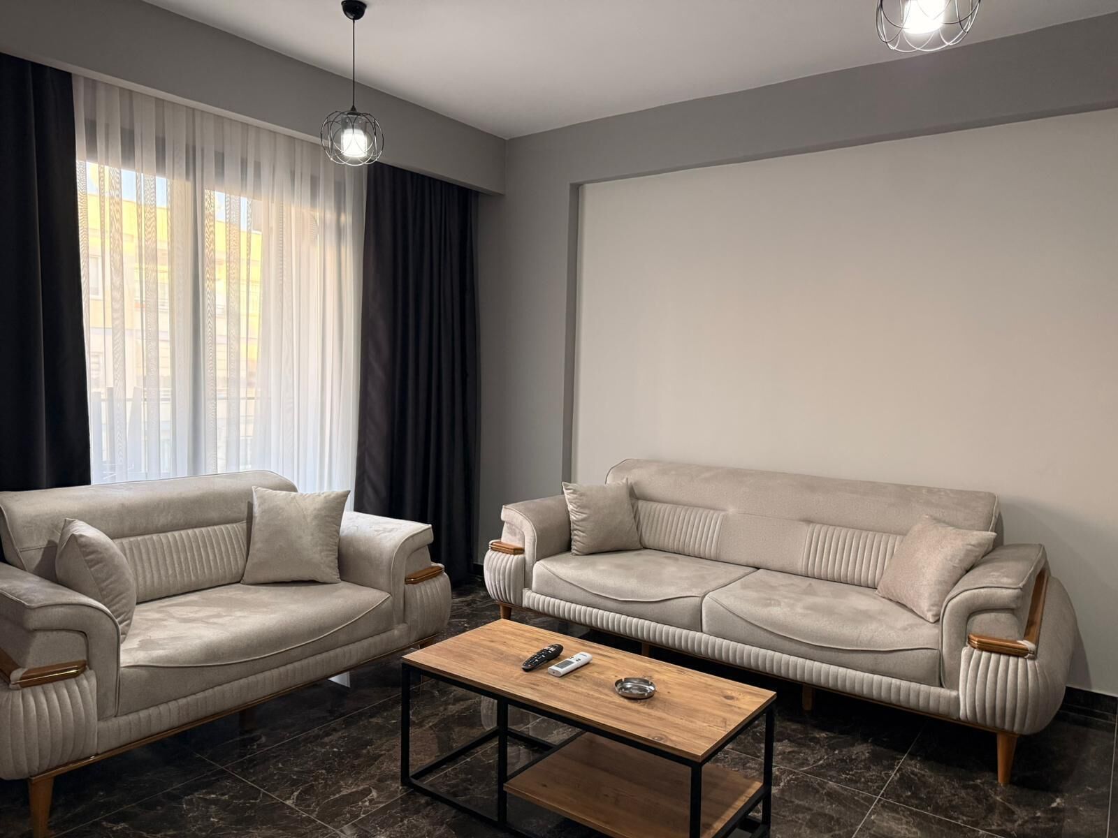 Deluxe-Apartment, Balkon, Gartenblick | Wohnbereich