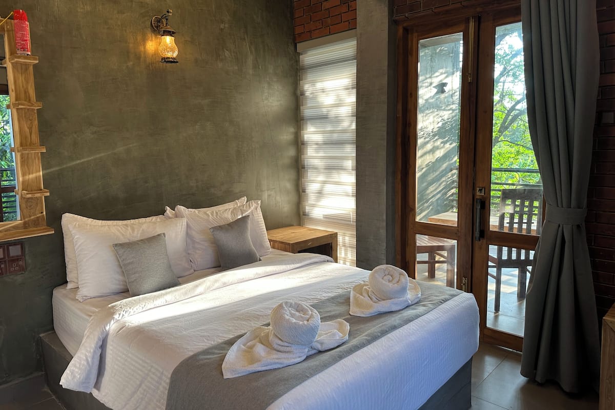 Deluxe-Doppelzimmer, Terrasse, Gartenblick