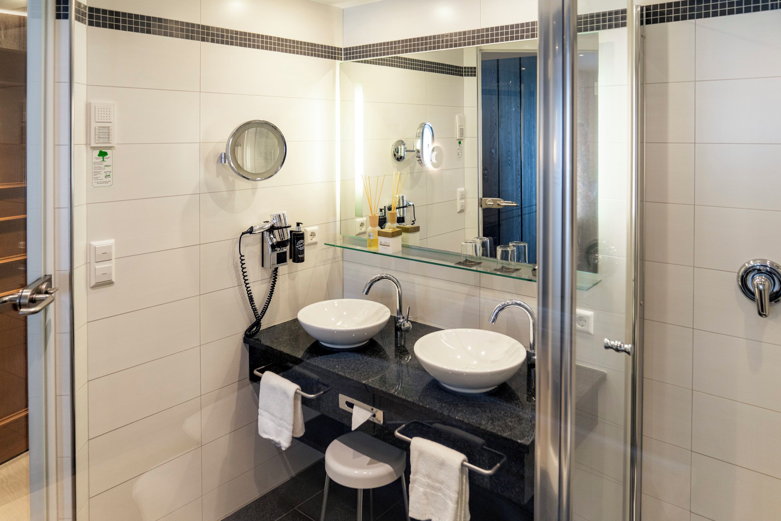 Hair dryer, towels, soap, shampoo