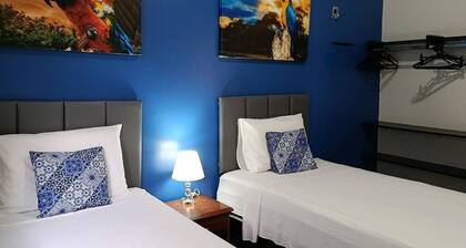 Room 2 Combu; comfort and air conditioning near the airport, twin beds.