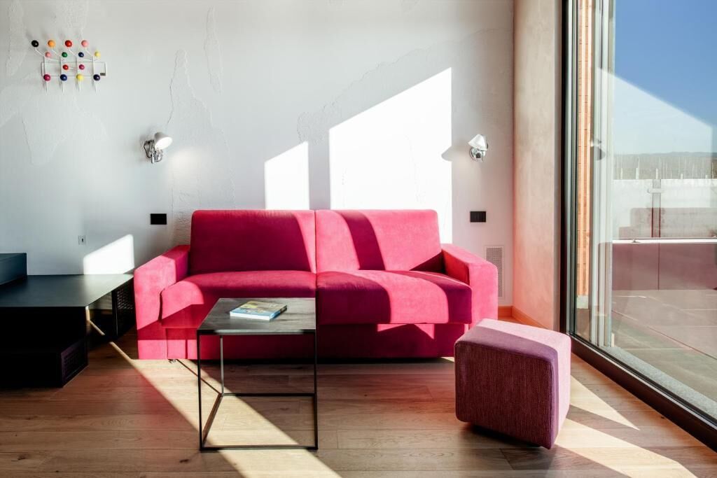 Standard Apartment, Balcony, Pool View | Living area