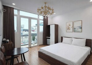 Luxury Studio Suite | Living area | Flat-screen TV - Dreamora Centre Hotel (Ba Dinh)