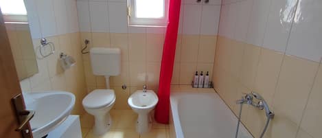 Hair dryer, towels, soap, toilet paper