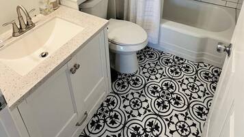 Bidet, towels, toilet paper