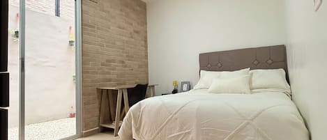 2 habitaciones, tabla de planchar con plancha, wifi y ropa de cama