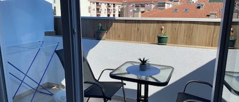 Economy Double Room, City View | Outdoor dining